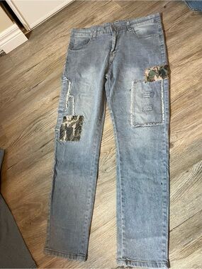 Light Wash Patchwork Jeans with Camouflage Accents